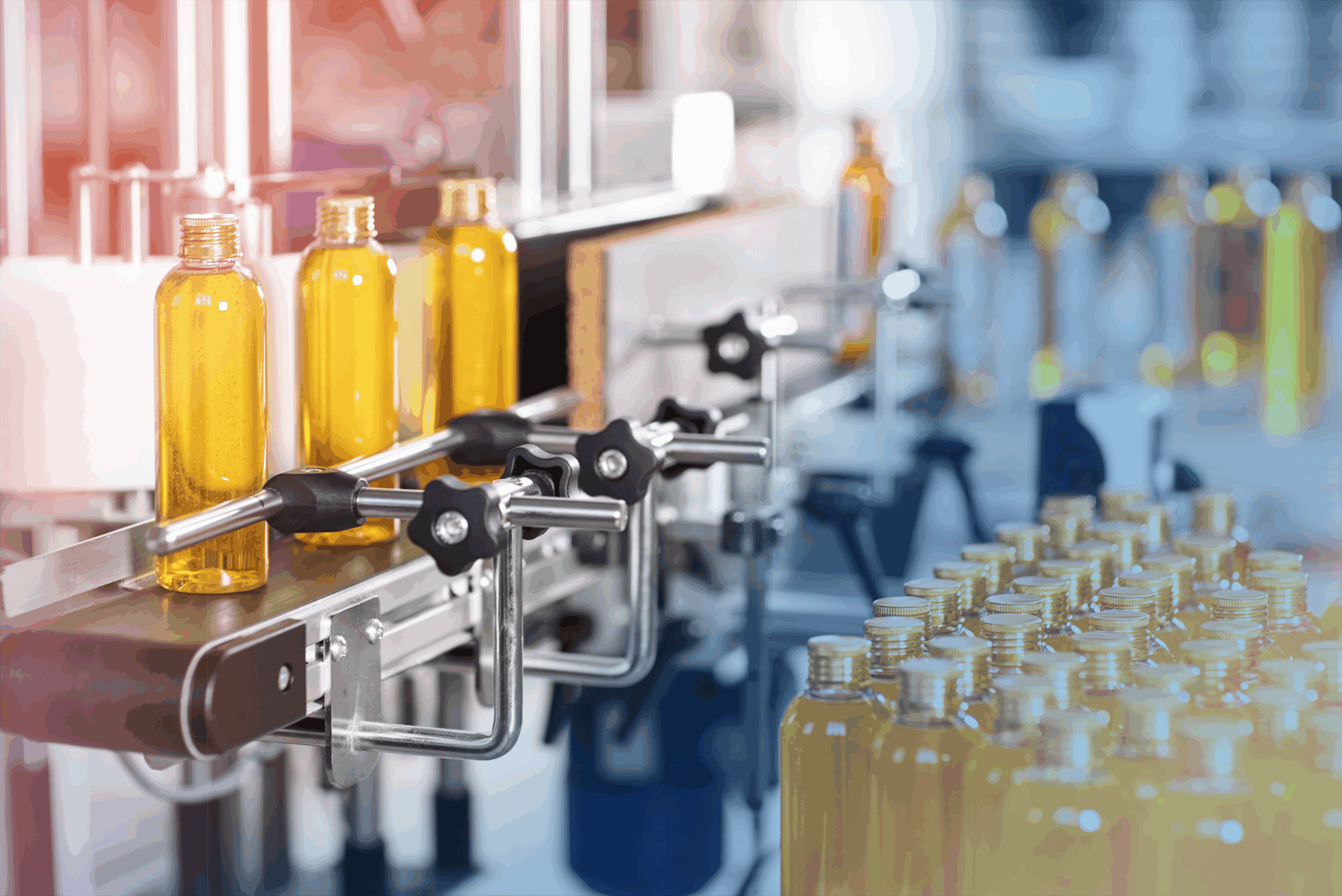 up to data | Pharmaceutical production line with amber glass bottles on conveyor belt and automated filling machinery in modern manufacturing facility